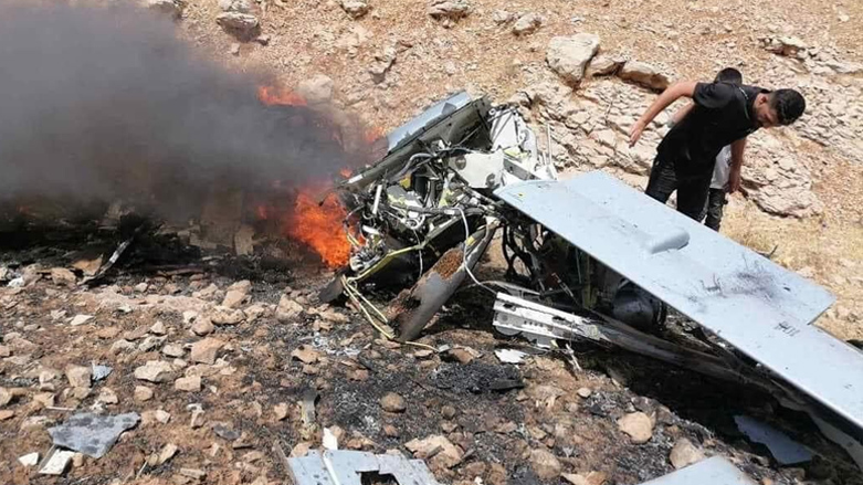 Locals gather at the crash site of the drone in Raparin administration, July 17, 2023. (Photo: Submitted to Kurdistan 24)