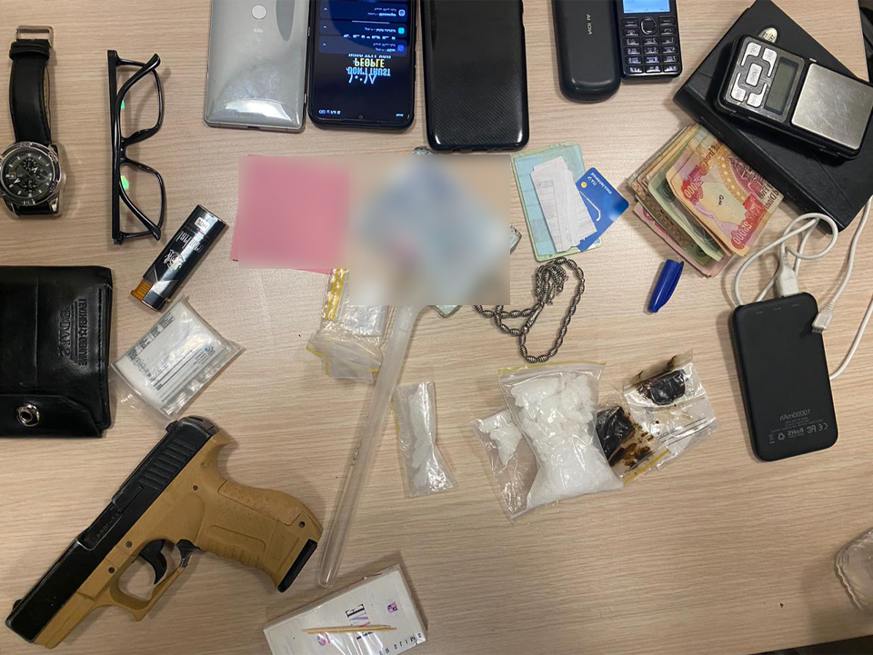 A Glock pistol was seized, in addition to narcotics and cash. (Photo: Kurdistan Region's Anti-Narcotics Directorate)