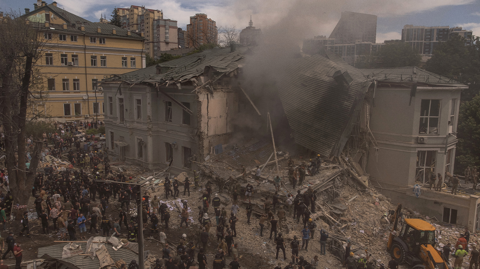 Mourning in Kyiv as rescuers clear rubble from children's hospital