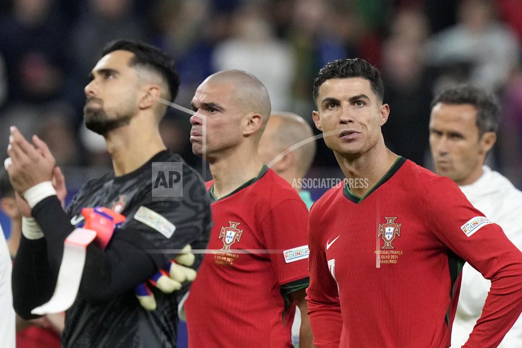 Portugal's goalkeeper Diogo Costa, Pepe and Cristiano Ronaldo, from left, match between Portugal and France at the Euro 2024 football tournament in Hamburg, Germany. (Photo: AP)