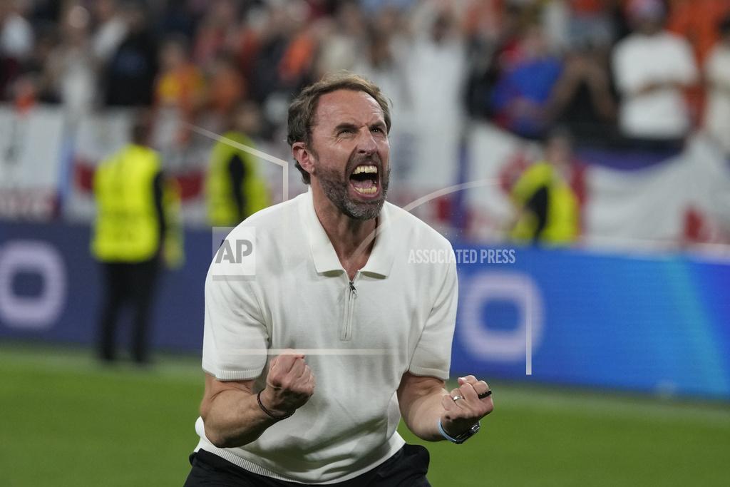 England's manager Gareth Southgate celebrates at the end of a semifinal against Netherlands. (Photo: AP) 
