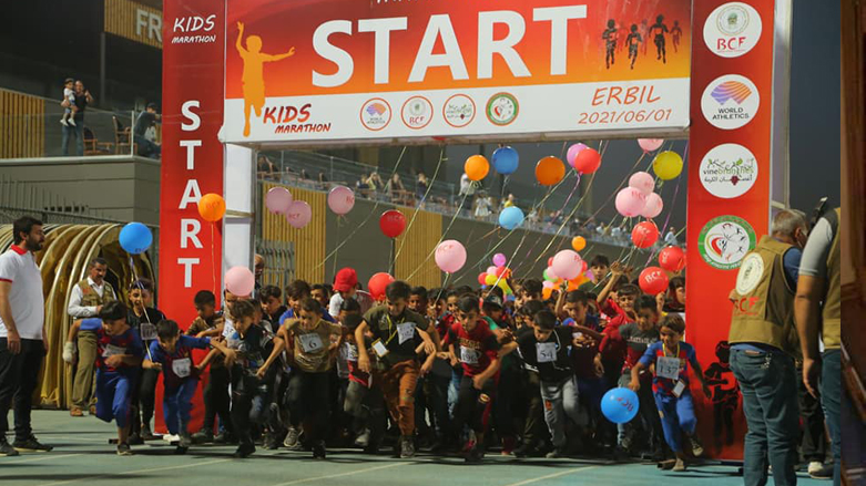 The IDP and refugee kids are pictured as they kick off the marathon in the Kurdistan Region's Franso Hariri International Stadium, June 1, 2021. (Photo: Erbil governorate)