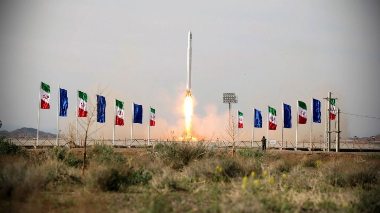 In this photo released on April 22, 2020, by Sepahnews, an Iranian rocket carrying a satellite is launched from an undisclosed site believed to be in Iran's Semnan province. (Sepahnews via AP)