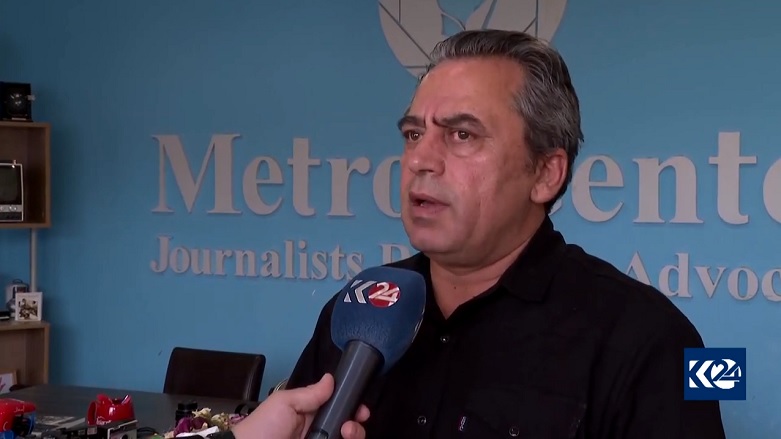 Rahman Gharib, the head of Metro Center for Journalists rights and advocacy, is pictured speaking to Kurdistan 24, June 20, 2021. (Photo: Kurdistan 24)