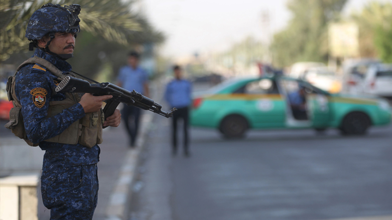 A member of the Iraqi federal police is pictured while standing on guard in the Iraqi capital Baghdad. (Photo: AFP)