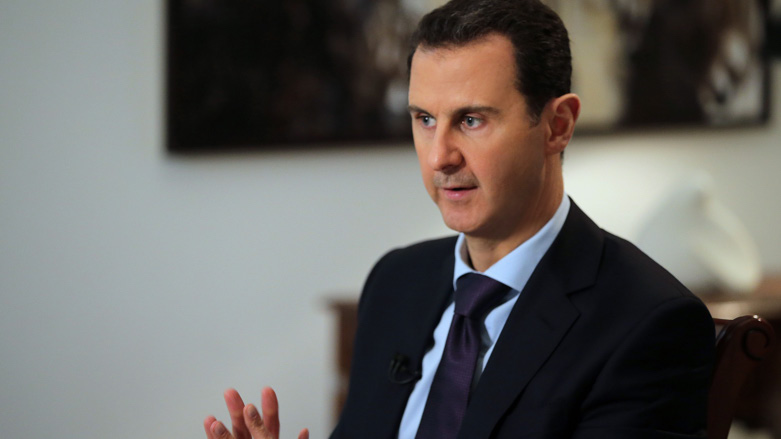 Syrian President Bashar al-Assad gestures during an interview with AFP in the capital Damascus on February 11, 2016 (Photo: AFP/JOSEPH EID/Getty Images)