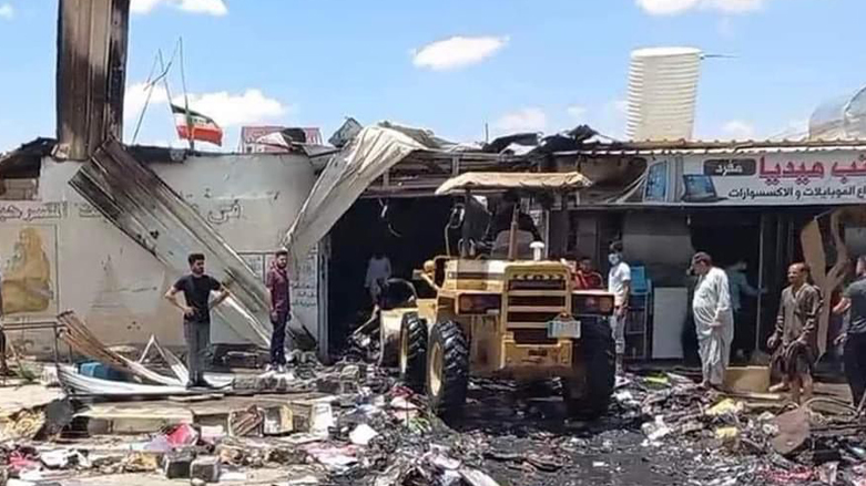 A bulldozer clears debris from the targeted building in Sinjar's Snuny, June 15, 2022. (Photo: Submitted to Kurdistan 24)