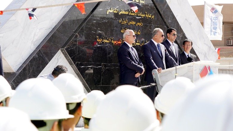 Iraqi Prime Minister Mustafa Al-Kadhimi laying the foundation stone for a project to build 1,000 schools in the country, June 18, 2022 (Photo: Iraqi Prime Minister’s Office)