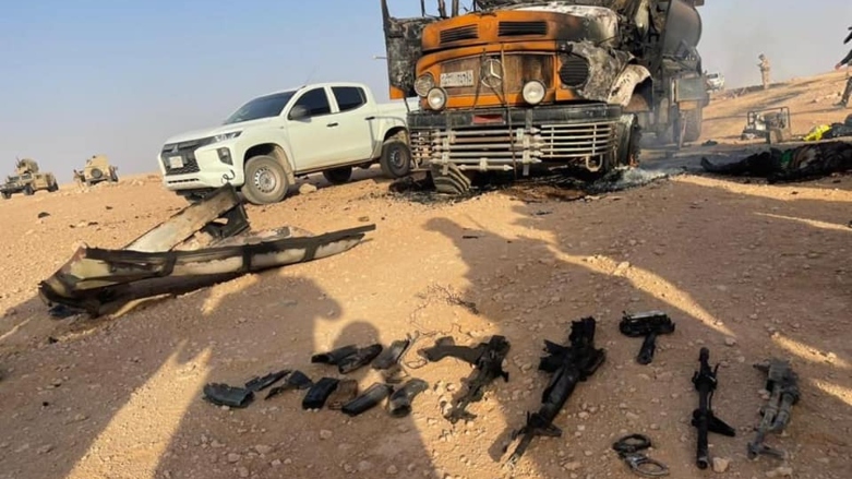 Confiscated firearms and a bombed truck on display, June 19, 2022. (Photo: Iraqi Federal Intelligence and Investigations Agency)