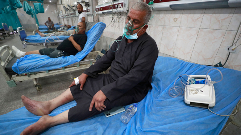 Iraqis receive treatment at an emergency ward in Sheikh Zayed Hospital in Baghdad as thousands were hospitalised across the country during a heavy sandstorm, May 6, 2022. (Photo: Ahmad Al-Rubaye/AFP)