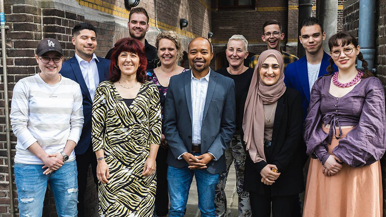 Lava Haji (in headscarf) stands with instructors and members of the vocational training establishment after she's named the Netherland's 2022 Student of the Year, May 2022. (Photo: Courtesy of Lava Haji)