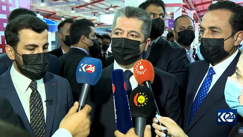 Kurdistan Region Prime Minister Masrour Barzani (center) speaks to reporters during the HITEX tech exhibition in Erbil, June 29, 2022 (Photo: Kurdistan 24)