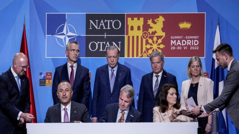 The signing of a memorandum in which Turkey agreed to Finland and Sweden's membership of NATO in Madrid, Spain, June 28, 2022. (Photo: Bernat Armangue/AP)
