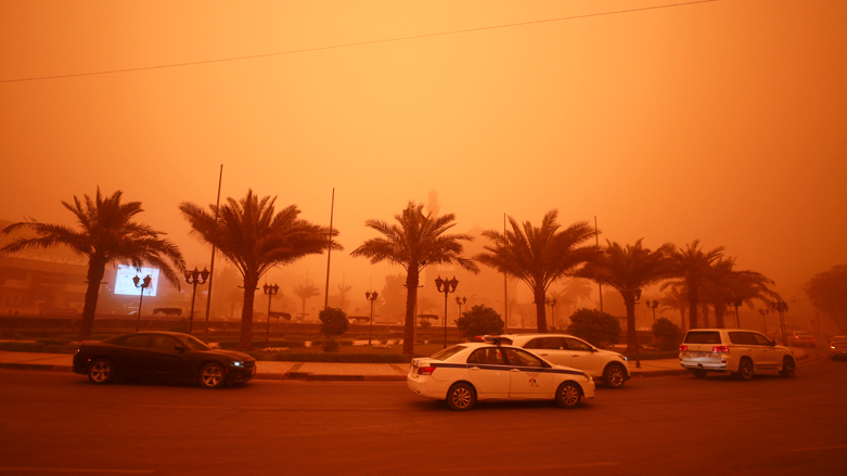 Vehicles drive along a road during a severe dust storm in Iraq's capital Baghdad on May 1, 2022. (Photo: Ahmad Al-Rubaye/AFP)