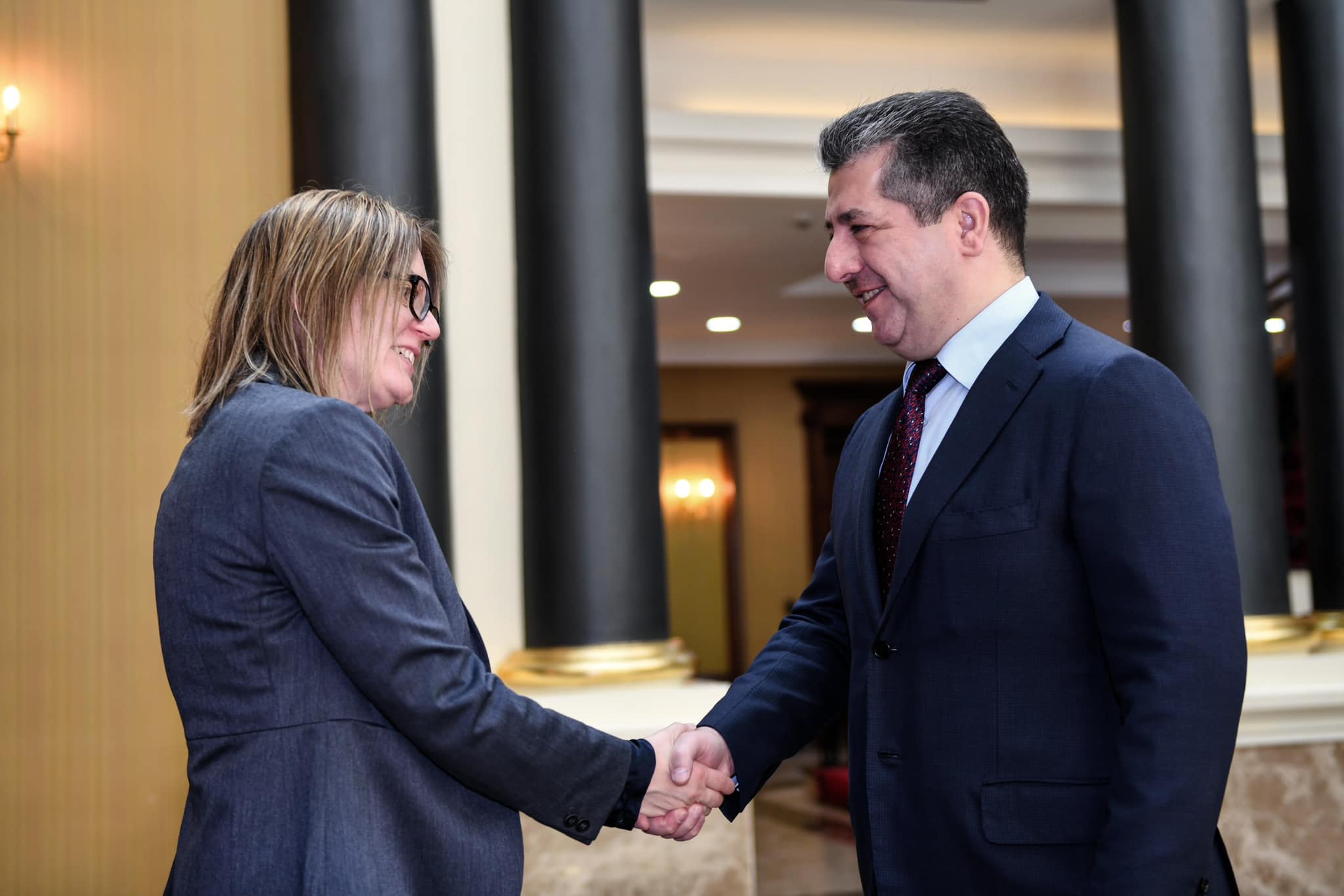 Kurdistan Region Prime Minister Masrour Barzani (right) shaking hands with Swedish Ambassador to Iraq Jessica Svardstrom in Erbil, June 5, 2023. (Photo: KRG)