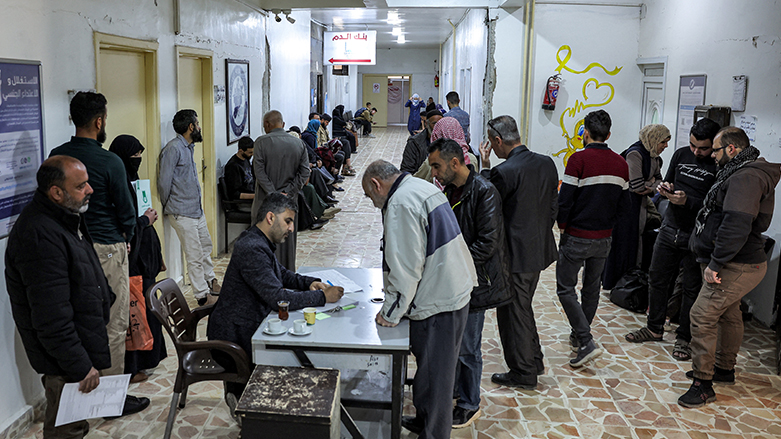 people register as they arrive at the Haematology and Oncology department run by the Syrian American Medical Society (SAMS) at Idlib Central Hospital in the rebel-held northwestern Syrian city. (Photo: AFP)