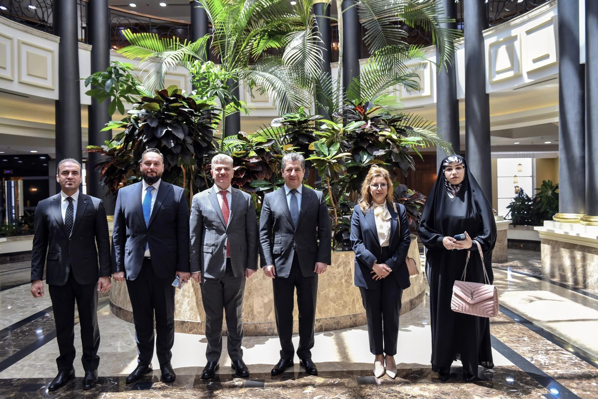 Kurdistan Region Prime Minister Masrour Barzani (third from right) standing for a group photo with a delegation of Iraqi Communications and Media Commission in Erbil, June 16, 2023. (Photo: KRG)
