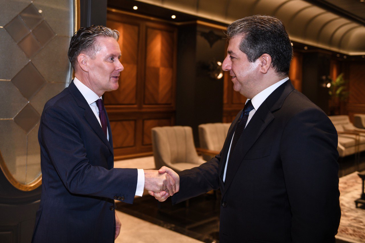 Kurdistan Region Prime Minister Masrour Barzani (right) shaking hands with Netherlands Ambassador to Iraq Hans Sandee, June 19, 2023. (Photo: KRG) 