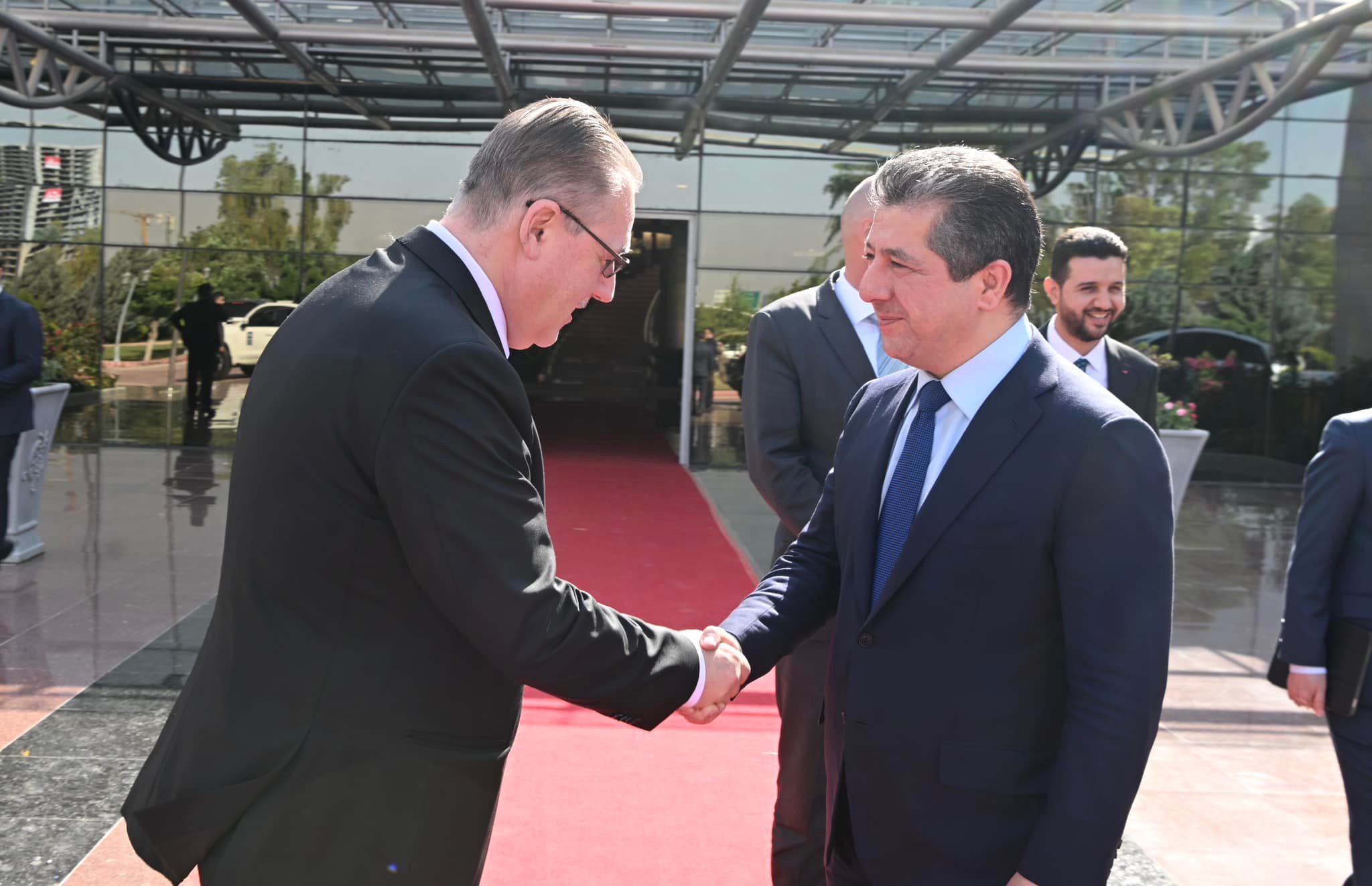 Kurdistan Region Prime Minister Masrour Barzani (right) shaking hands with Abdallah al-Dardari, UN Assistant Secretary-General and Director of the Regional Bureau for Arab States of the UNDP, June 21, 2023 (Photo: KRG)