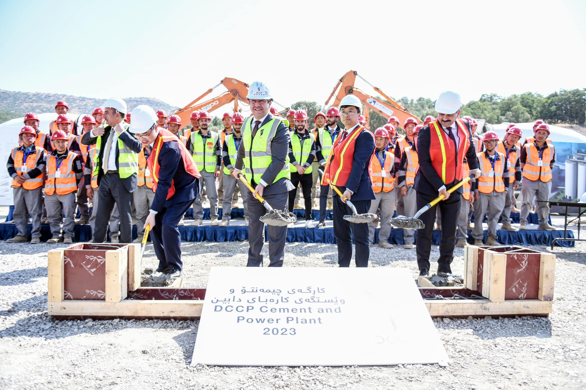 Kurdistan Region Prime Minister Masrour Barzani (center) laying the foundation stone of Dabin cement plant in Erbil, June 22, 2023. (Photo: KRG)