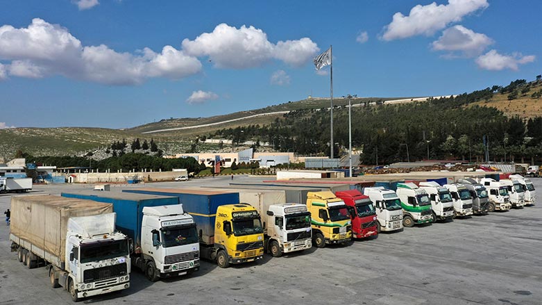 Trucks loaded with United Nations humanitarian aid for Syria following a devastating earthquake are parked at Bab al-Hawa border crossing with Turkey, in Syria's Idlib province, on Feb. 10, 2023. (Photo: Ghaith Alsayed/ AP)