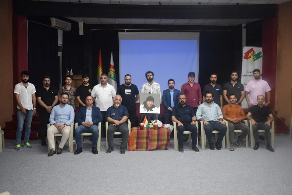 Mourners showcase painting prepared in Rasul's honor, June 22, 2023. (Photo: Ala Center)