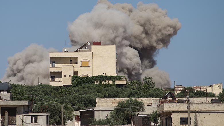 A plume of smoke rises from a building following a reported Russian air strike on Syria's northwestern rebel-held Idlib province, on June 25, 2023. (Photo: Abdulaziz ketaz/ AFP)