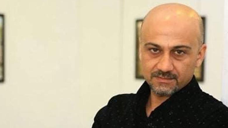 Karwan Qadir Kaban, a Kurdish artist who is participating in the JAALA International Art Exchange Exhibition. (Photo: Kurdistan 24)