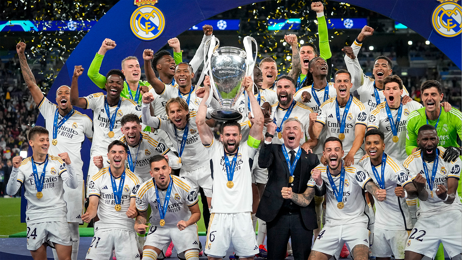 Real Madrid's players celebrate with the trophy after winning the Champions League final. (Photo: AP)