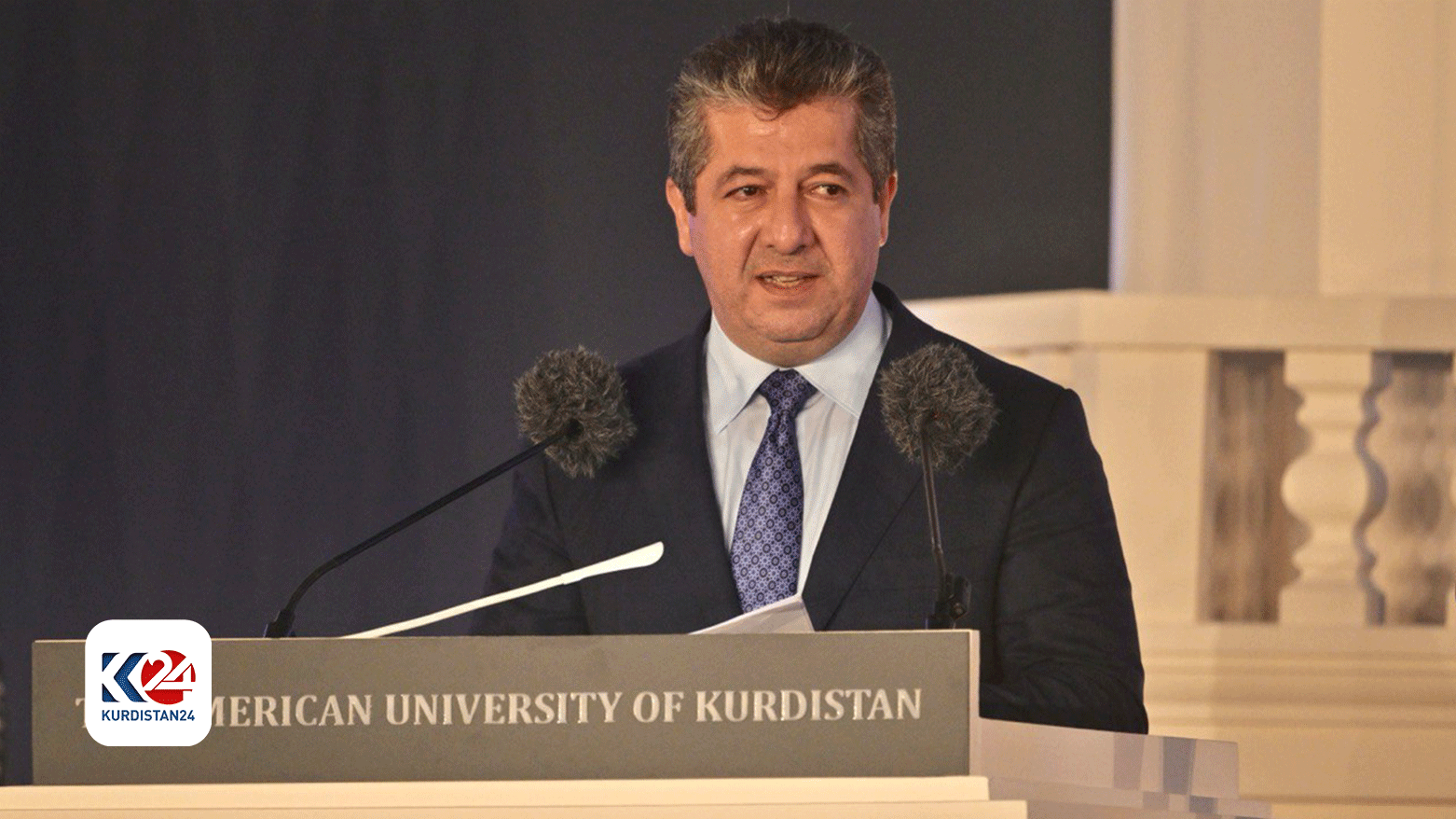 Kurdistan Region Prime Minister Masrour Barzani delivering a speech at the AUK graduation ceremony, June 2, 2024. (Photo: Kurdistan24)