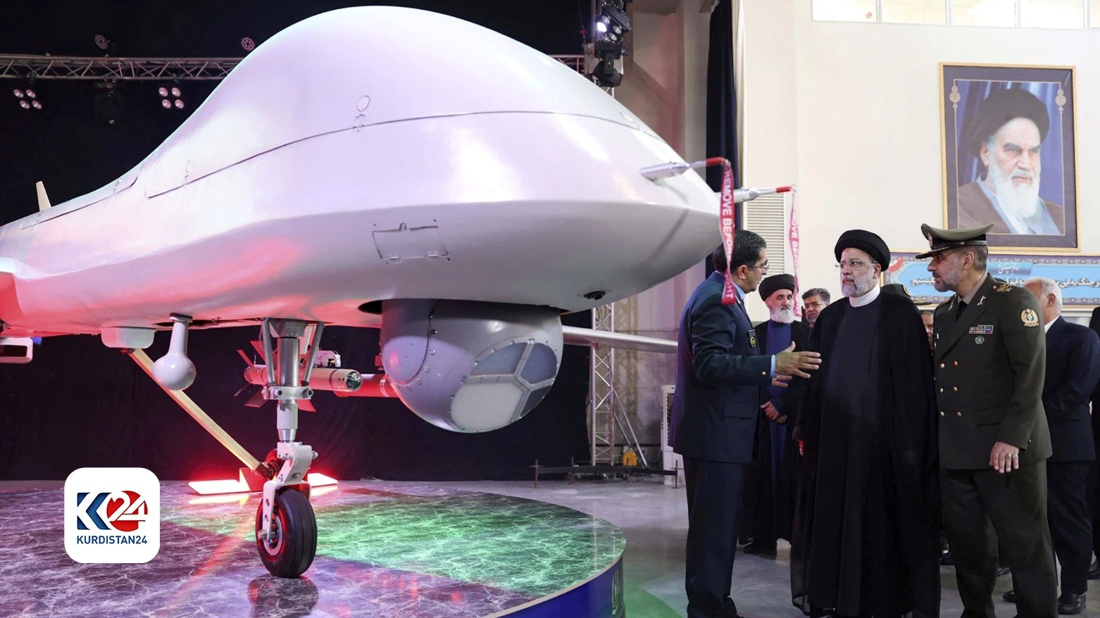Defense Minister Gen. Mohammad Reza Gharaei Ashtiani, first right, President Ebrahim Raisi, second right, Chief of Aviation Industries of Armed Forces Gen. Afshin Kajeh fard, explaining a drone called the Mohajer-10 (Photo: AP)