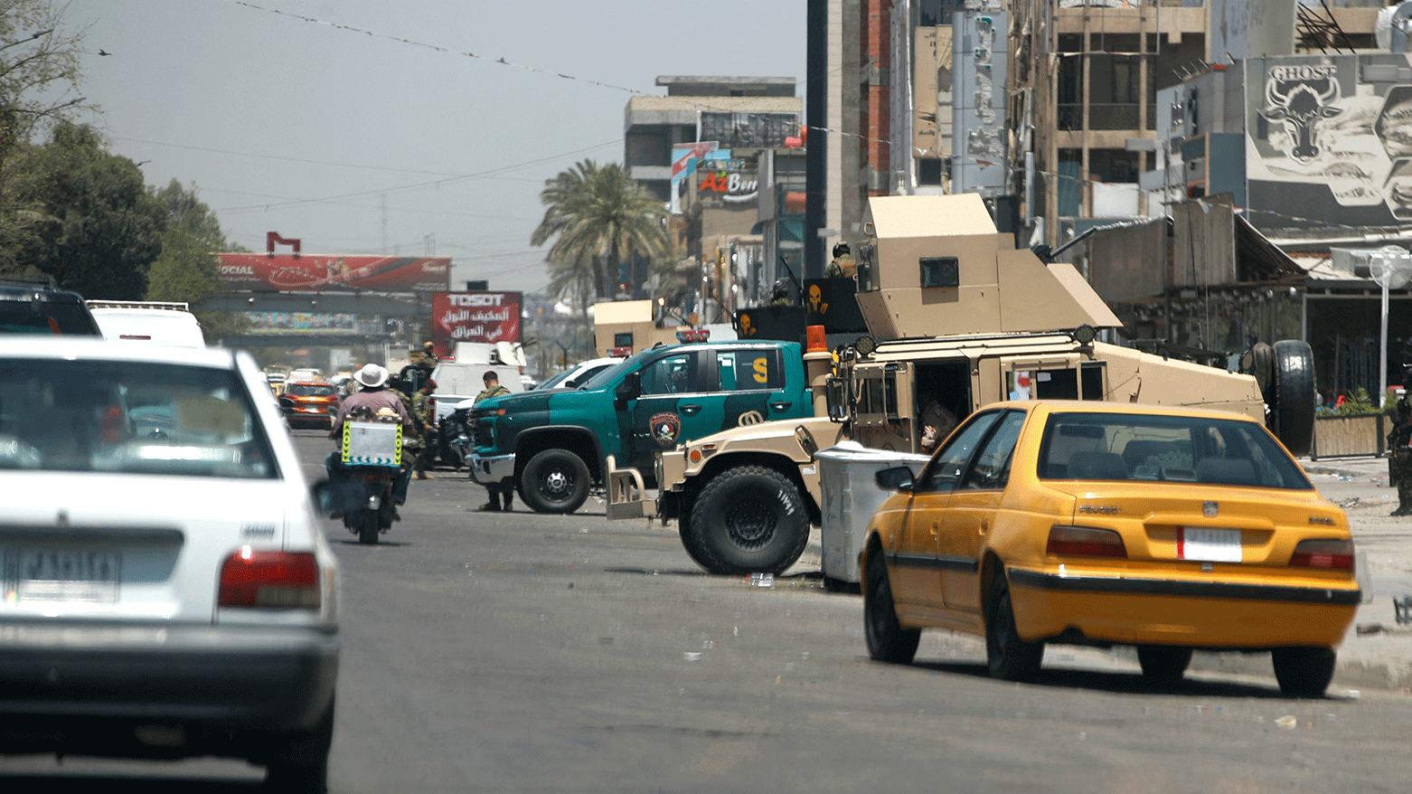 Iraqi security forces secure Palestine Street the day after some 30 people attacked two restaurants, including the American KFC, in Baghdad on June 4, 2024. (Photo: AFP)