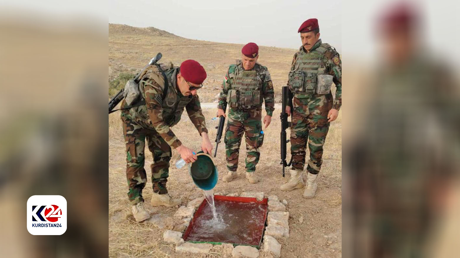 Peshmerga forces provide water for wild animals