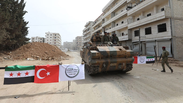 Turkish-backed groups running a checkpoint in Afrin, Syria, March 2018 (Photo: AFP)