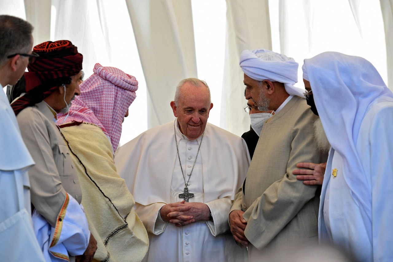 Pope Francis speaks with Iraqi religious figures during an interfaith service in the ancient city of Ur in southern Iraq's Dhi Qar province, March 6, 2021. (Photo: Vatican Media)