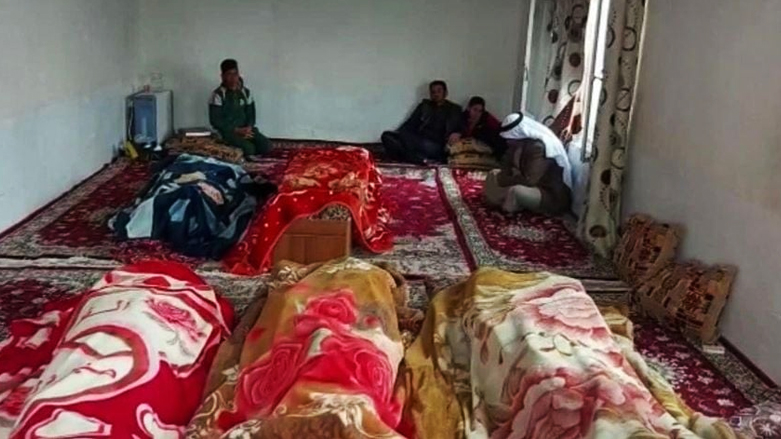 A photo posted on social media purports to show family members grieving those killed by Islamic State militants south of the Iraqi city of Tikrit on Friday morning. (Photo: Social Media)