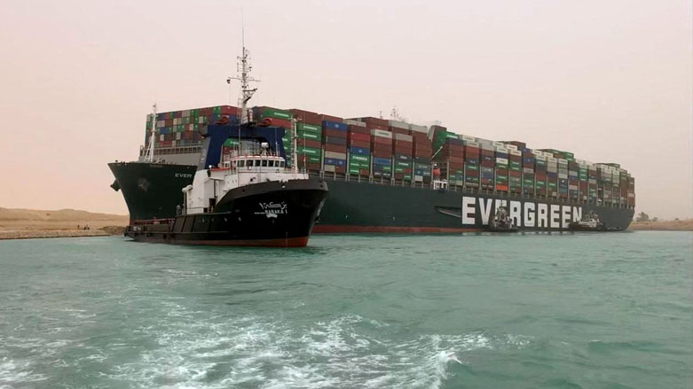 A giant container ship ran aground in the Suez Canal after a gust of wind blew it off course, bringing marine traffic to a halt along one of the world's busiest trade routes. (Photo: AFP / HO/ Suez Canal)