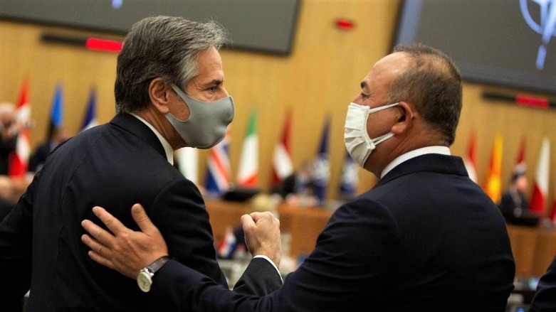 US Secretary of State Antony Blinken (left) greets Turkish Foreign Minister Mevlut Cavusoglu before a NATO foreign ministers meeting in Brussels in March 2021. (Photo: AFP)