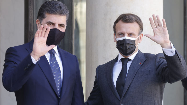 French President Emmanuel Macron (R) poses with President of Iraq's autonomous Kurdistan Region Nechirvan Barzani prior to a working lunch at the Elysee Palace in Paris, March 30, 2021. (Photo: Ludovic Marin/AFP)