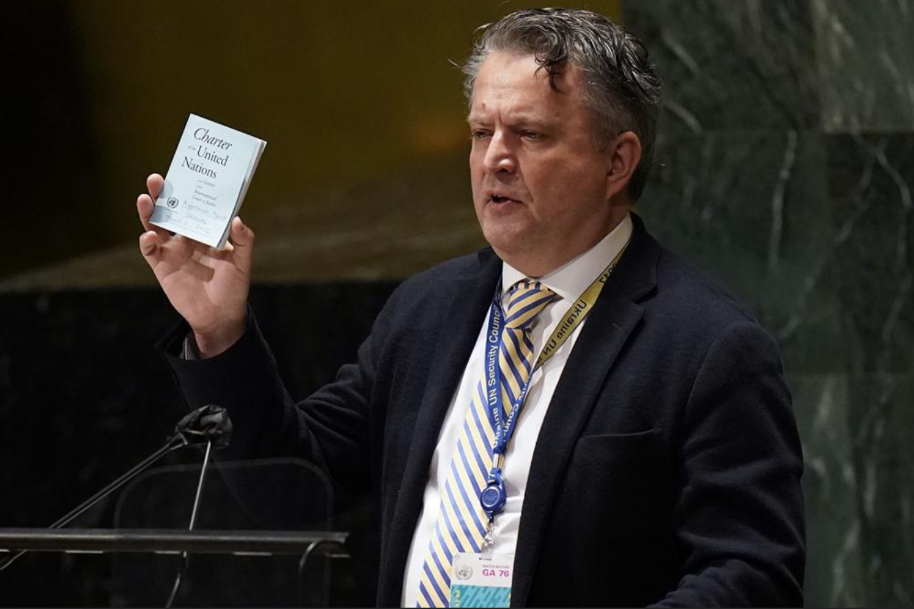 Ukrainian Ambassador to the UN Sergiy Kyslytsya holds up a copy of the charter of the UN while speaking during an emergency meeting of the General Assembly at United Nations headquarters, Wednesday, Mar. 2, 2022. (Photo: Seth Wenig/AP)