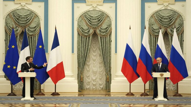 Russian President Vladimir Putin, right, listens during a joint press conference with French President Emmanuel Macron after their talks Monday, Feb. 7, 2022 in Moscow. (Photo: Thibault Camus, Pool/AP)