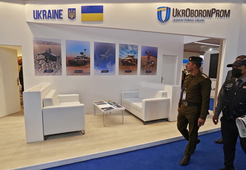 Iraqi army officers walk past the Ukrainian stand during the 10th edition of the Baghdad security, defence and military industry fair, March 2, 2022. (Photo: Ahmad al-Rubaye/AFP)