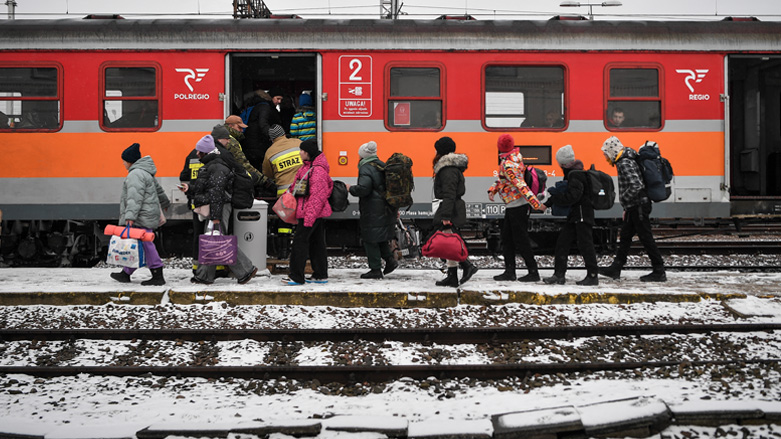 Newly arrived refugees from Ukraine board a train bound for Krakow in Medyka, eastern Poland, on March 9, 2022. (Photo: Louisa Gouliamaki/AFP