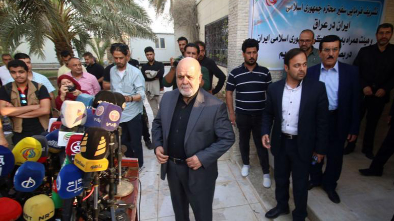 Iranian Ambassador to Iraq Iraj Masjidi (center) during a press conference in Baghdad. (Photo: AFP)