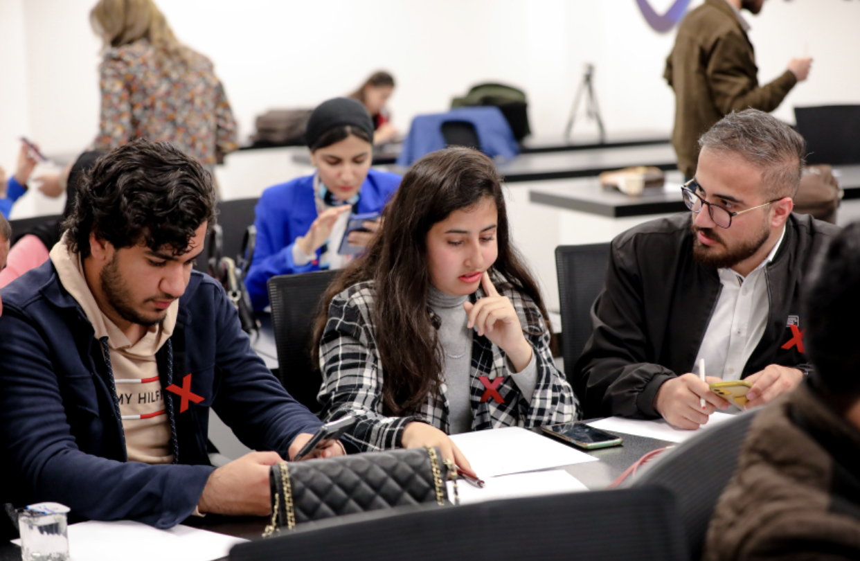 A number of the TEDxNishtiman volunteers working on the preparations for the fifth round of the event in Erbil. (Photo: TEDxNishtiman)