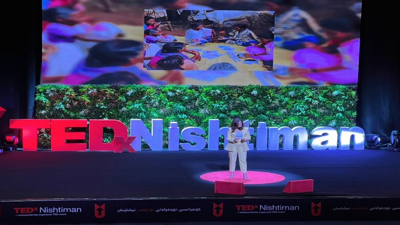 Goshan Karadaghi presents the first speech of the TEDxNishtiman2022 in Erbil, Mar. 26, 2022. (Photo: Kurdistan 24)