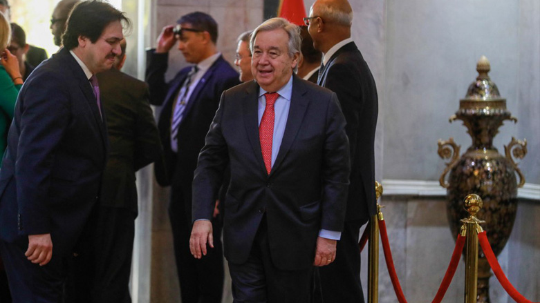 UN Secretary-General Antonio Guterres (C) arrives for a meeting with Iraq's foreign minister at the foreign ministry in Baghdad, March 1, 2023. (Photo: Ahmad Al-Rubaye/AFP)