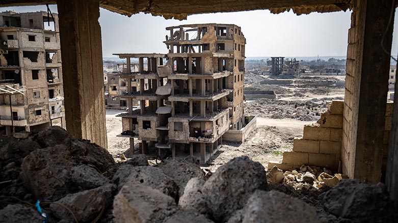 A war-damaged building housing displaced Syrians is pictured in Syria's rebel-held northern city of Raqa on March 1, 2023. (Photo: Delil Souleiman/ AFP)