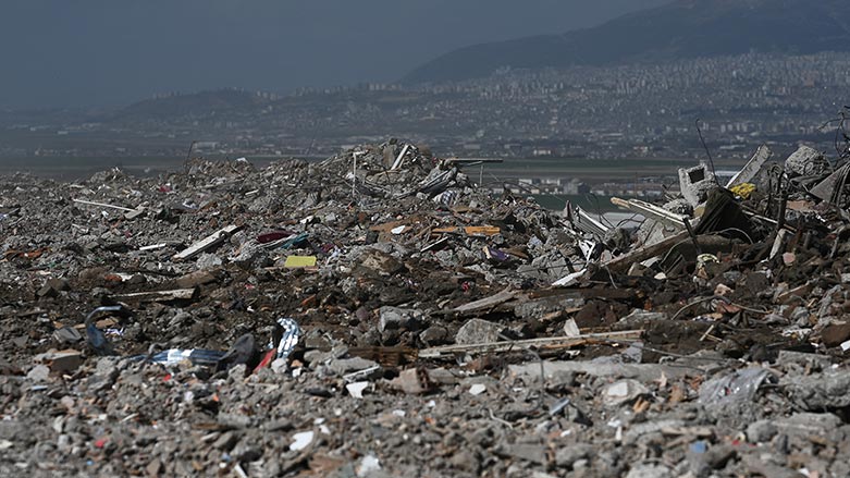 A photo shows debris from collapsed buildings dumped on top of a hill in Kahramanmaras, on March 4, 2023, one month after a massive earthquake struck south-east Turkey.  (Photo: AFP)