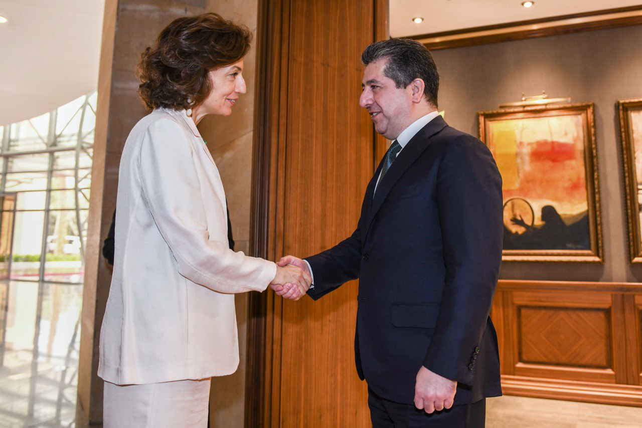 Prime Minister Masrour Barzani (right) shaking hands with with the Director-General of the UNESCO, Audrey Azoulay, March 8, 2023. (Photo: KRG)